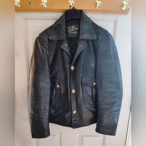 Black leather quilted coat